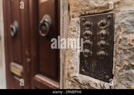 Vintage intercom buttons on the street of Florence, Italy Stock Photo