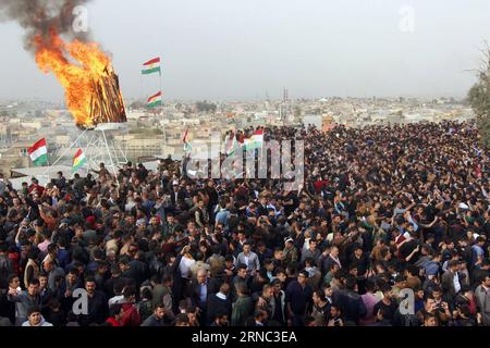 (160320) -- KIRKUK, March 20, 2016 -- Kurdish people gather around the fire to celebrate Nowruz in Kirkuk, Iraq on March 20, 2016. Hundreds of Kurdish families flocked to public parks in the Iraqi northern city of Kirkuk to celebrate the ancient holiday Nowruz, marking the start of the Kurdish New Year on March 20, 2016. ) IRAQ-KIRKUK-NOWRUS-CELEBRATION AkoxZangana PUBLICATIONxNOTxINxCHN   Kirkuk March 20 2016 Kurdish Celebrities gather Around The Fire to Celebrate Nowruz in Kirkuk Iraq ON March 20 2016 hundreds of Kurdish families Flocked to Public Parks in The Iraqi Northern City of Kirkuk t Stock Photo