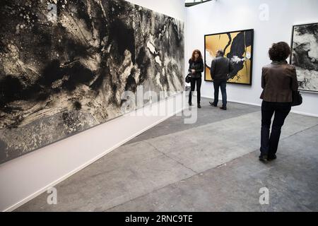 (160330) -- PARIS, March 30, 2016 -- Visitors look at paintings during a preview of the Paris Art Fair, at the Grand Palais in Paris, France, March 30, 2016. The Paris Art Fair 2016 will open from March 31st to April 3rd, with the participantion of over 150 art galleries from all over the world. ) FRANCE-PARIS-CULTURE-ART FAIR TheoxDuval PUBLICATIONxNOTxINxCHN   Paris March 30 2016 Visitors Look AT Paintings during a Preview of The Paris Art Fair AT The Grand Palais in Paris France March 30 2016 The Paris Art Fair 2016 will Open from March 31st to April 3rd With The  of Over 150 Art Galleries Stock Photo