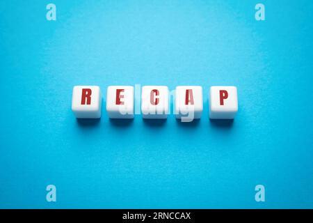 Wooden blocks with the word Recap. A document presenting your skills and achievements. Getting a new job position. Business concept. Resume. Interview Stock Photo