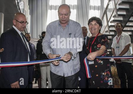 Messe Construction Fair in Havana (160406) -- HAVANA, April 5, 2016 -- Cuba s Construction Minister Rene Mesa (L), Foreign Trade Minister Rodrigo Malmierca (C) and Chile s Housing and Urbanism Minister Maria Paulina cut the ribbon during the opening ceremony of 6th International Construction Fair at Pabexpo exhibition complex in Havana, Cuba, on April 5, 2016. According to local press, around 199 exhibitors from 29 countries and regions participated in this 5-day fair, which kicked off on April 5. ) CUBA-HAVANA-CONSTRUCTION-FAIR JoaquinxHernandez PUBLICATIONxNOTxINxCHN   trade Fair Constructio Stock Photo