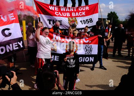 Old Trafford Football Stadium, Manchester, UK. 16th April 2022. Thousands of Manchester United protest demanding the Glazer family sell the club Stock Photo