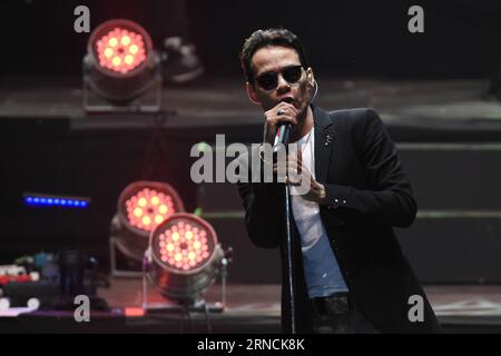 (160415) -- MONTEVIDEO, April 14, 2016 -- Puerto Rican singer Marc Anthony performs during a concert as part of his 2016 South American tour Marc Anthony Live , at Centenario Stadium in Montevideo, capital of Uruguay, on April 14, 2016. Nicolas Celaya) (fnc) (sp) URUGUAY-MONTEVIDEO-MUSIC-CONCERT e NICOLASxCELAYA PUBLICATIONxNOTxINxCHN   160415 Montevideo April 14 2016 Puerto Rican Singer Marc Anthony performs during a Concert As Part of His 2016 South American Tour Marc Anthony Live AT Centenario Stage in Montevideo Capital of Uruguay ON April 14 2016 Nicolas Celaya FNC SP Uruguay Montevideo M Stock Photo