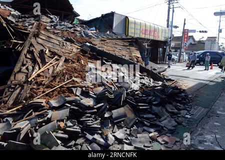 (160417) -- KUMAMOTO, April 17, 2016 -- Debris of destroyed houses are seen in the earthquake rocked Mashiki in Kumamoto prefecture, Japan, April 17, 2016. A powerful magnitude-7.3 earthquake struck the island of Kyushu in southwestern Japan early Saturday just a day after a sizable foreshock hit the region, with the number of fatalities now standing at 41 according to the latest figures on Sunday. ) (djj) JAPAN-KUMAMOTO-EARTHQUAKE-AFTERMATH MaxPing PUBLICATIONxNOTxINxCHN   160417 Kumamoto April 17 2016 debris of destroyed Houses are Lakes in The Earthquake Rocked Mashiki in Kumamoto Prefectur Stock Photo