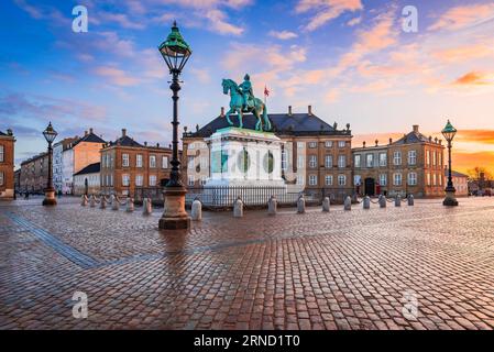 Copenhagen, Denmark. Morning sunrise light with colored clouds, Amalienborg Square, beautiful Northern city of Europe. Stock Photo