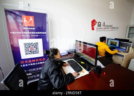 (160504) -- BAINGOIN, May 4, 2016 -- Working staff maintain an online trade platform in Baingoin County, southwest China s Tibet Autonomous Region, March 20, 2016. With an elevation of 4,747 meters, Baingoin County was basically cut off from the outside world and was rarely known by people. An online trade platform was set up and linked the county and outside world, which greatly changed the locals who were self-supported by animal husbandry. ) (wyl) CHINA-TIBET-E-COMMERCE (CN) JigmexDorje PUBLICATIONxNOTxINxCHN   160504 Baingoin May 4 2016 Working Staff maintain to Online Trade Platform in Ba Stock Photo