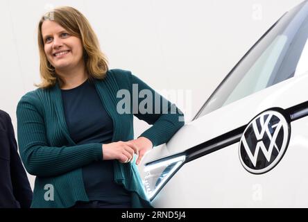 Hanover, Germany. 01st Sep, 2023. Julia Willie Hamburg (Greens), Minister of Education of Lower Saxony and VW Supervisory Board member, stands in front of an ID.Buzz electric bus during the welcoming of new trainees at the Volkswagen Academy Hanover at the VW Commercial Vehicles plant. Julia Willie Hamburg visited the VW Academy as part of her summer trip. Credit: Julian Stratenschulte/dpa/Alamy Live News Stock Photo