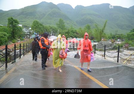 Staff Workers Evacuate Tourists At The Mingyueshan Scenic Spot In.