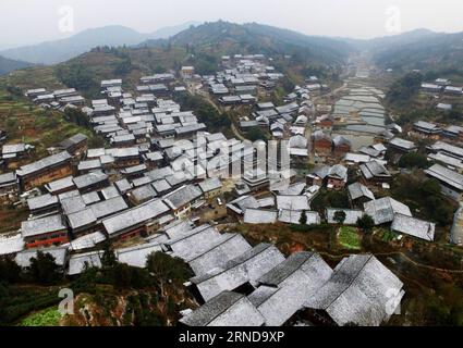 (160512) -- SANJIANG, May 12, 2016 -- This photo taken with unmanned aerial vehicle on Feb. 2, 2016 shows the snow scenery of the Gaoyou Village in Linxi Town of Sanjiang Dong Autonomous County, south China s Guangxi Zhuang Autonomous Region. Sanjiang Dong Autonomous County, located in the north of Guangxi, is renowned in the world for its large numbers of drum towers, wind and rain bridges and traditional buildings of Dong ethnic group. ) (zwx) CHINA-GUANGXI-SANJIANG-SCENERY (CN) GongxPukang PUBLICATIONxNOTxINxCHN   160512 Sanjiang May 12 2016 This Photo Taken With Unmanned Aerial Vehicle ON Stock Photo