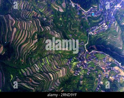 (160512) -- SANJIANG, May 12, 2016 -- This photo taken with unmanned aerial vehicle on May 5, 2016 shows the Linlue Village in Dudong Township of Sanjiang Dong Autonomous County, south China s Guangxi Zhuang Autonomous Region. Sanjiang Dong Autonomous County, located in the north of Guangxi, is renowned in the world for its large numbers of drum towers, wind and rain bridges and traditional buildings of Dong ethnic group. ) (zwx) CHINA-GUANGXI-SANJIANG-SCENERY (CN) HuangxXiaobang PUBLICATIONxNOTxINxCHN   160512 Sanjiang May 12 2016 This Photo Taken With Unmanned Aerial Vehicle ON May 5 2016 Sh Stock Photo