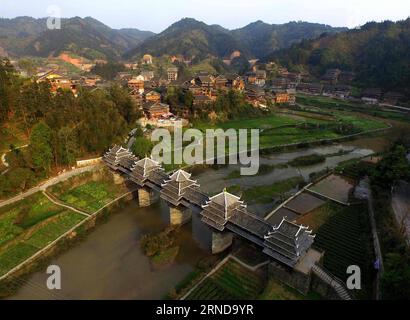 (160512) -- SANJIANG, May 12, 2016 -- This photo taken with unmanned aerial vehicle on March 25, 2016 shows the Chengyang wind and rain bridge in Linxi Town of Sanjiang Dong Autonomous County, south China s Guangxi Zhuang Autonomous Region. Sanjiang Dong Autonomous County, located in the north of Guangxi, is renowned in the world for its large numbers of drum towers, wind and rain bridges and traditional buildings of Dong ethnic group. ) (zwx) CHINA-GUANGXI-SANJIANG-SCENERY (CN) HuangxXiaobang PUBLICATIONxNOTxINxCHN   Sanjiang May 12 2016 This Photo Taken With Unmanned Aerial Vehicle ON March Stock Photo