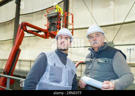 professional two engineers ar discussing the new project Stock Photo
