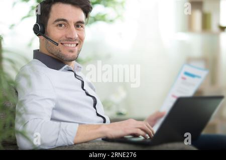 mature man working from home with laptop Stock Photo