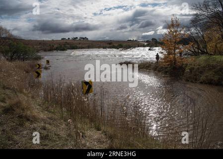 Unwetter in Australien (160607) -- CANBERRA, June 7, 2016 -- Photo taken on June 7, 2016 shows a submerged road due to the swelling of the Murrumbidgee River after heavy rains in Canberra, Australia. Four people have died while three are still missing from the massive storm front that hit Australia s east coast as major inland floods, giant waves and unusually high tides continue to wreak havoc. ) (djj) AUSTRALIA-CANBERRA-FLOOD JustinxQian PUBLICATIONxNOTxINxCHN   Storm in Australia 160607 Canberra June 7 2016 Photo Taken ON June 7 2016 Shows a submerged Road Due to The swelling of The Murrumb Stock Photo