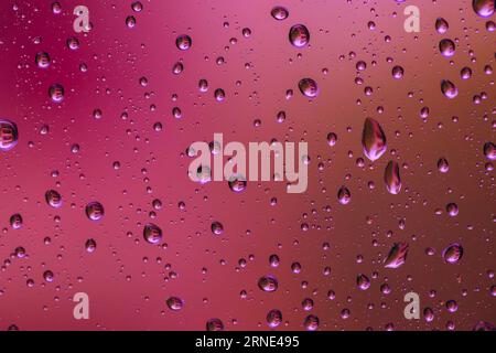 Water drops on window, colorful, macro foto of water drops on a window Stock Photo
