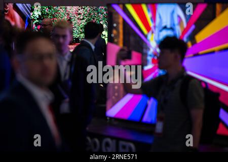 Berlin, Germany. 01st Sep, 2023. Visitors walk through the Samsung booth during the International Consumer Electronics Fair (IFA) at Messe Berlin. Since 1924, exhibitors have been showing off their new products at the Funkausstellung in Berlin. Credit: Sebastian Christoph Gollnow/dpa/Alamy Live News Stock Photo