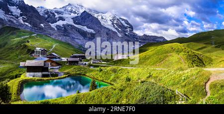 amazing Swiss nature . Kleine Scheidegg mountain pass that runs between the famous Eiger and the Lauberhorn famous for hiking in Bernese Alps. Switzer Stock Photo