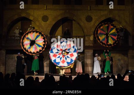 (160614) -- CAIRO, June 13, 2016 -- Egyptian dancers perform the Tanoura, an Egyptian version of Sufi Dance, at a night show during the holy fasting month of Ramadan, at Al Ghouri Palace in Cairo, Egypt, June 13, 2016. ) EGYPT-CAIRO-RAMADAN-SUFI DANCE MengxTao PUBLICATIONxNOTxINxCHN   160614 Cairo June 13 2016 Egyptian Dancers perform The Tanoura to Egyptian Version of Sufi Dance AT a Night Show during The Holy fasting Month of Ramadan AT Al Ghouri Palace in Cairo Egypt June 13 2016 Egypt Cairo Ramadan Sufi Dance MengxTao PUBLICATIONxNOTxINxCHN Stock Photo