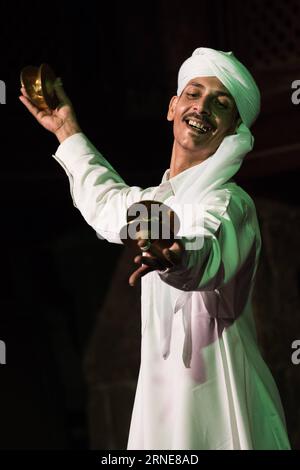 (160614) -- CAIRO, June 13, 2016 -- An Egyptian musician performs at a night show of the Tanoura, an Egyptian version of Sufi Dance, during the holy fasting month of Ramadan, at Al Ghouri Palace in Cairo, Egypt, June 13, 2016. ) EGYPT-CAIRO-RAMADAN-SUFI DANCE MengxTao PUBLICATIONxNOTxINxCHN   160614 Cairo June 13 2016 to Egyptian Musician performs AT a Night Show of The Tanoura to Egyptian Version of Sufi Dance during The Holy fasting Month of Ramadan AT Al Ghouri Palace in Cairo Egypt June 13 2016 Egypt Cairo Ramadan Sufi Dance MengxTao PUBLICATIONxNOTxINxCHN Stock Photo