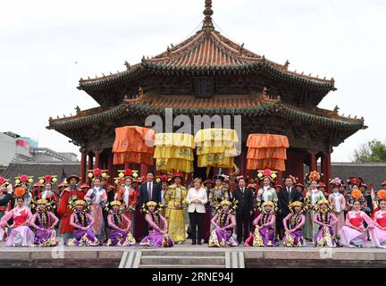(160614) -- SHENYANG, June 14, 2016 -- German Chancellor Angela Merkel poses for a group photo with performers at the Shenyang Palace Museum in Shengyang, capital of northeast China s Liaoning Province, June 14, 2016. Merkel visited Shengyang on Tuesday. )(mcg) CHINA-SHENYANG-MERKEL-VISIT (CN) LixGang PUBLICATIONxNOTxINxCHN   160614 Shenyang June 14 2016 German Chancellor Angela Merkel Poses for a Group Photo With Performers AT The Shenyang Palace Museum in Sheng Yang Capital of Northeast China S Liaoning Province June 14 2016 Merkel visited Sheng Yang ON Tuesday McG China Shenyang Merkel Visi Stock Photo