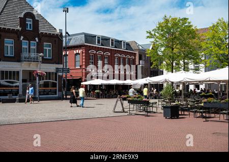 Weert, Limburg, The Netherlands, July 14, 2023 - People walking over the historical old market square of the village Stock Photo