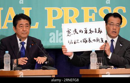 (160621) -- TOKYO, June 21, 2016 -- President of the ruling Liberal Democratic Party Shinzo Abe (L) and Katsuya Okada, leader of the main opposition Democratic Party of Japan, attend a debate in Tokyo, capital of Japan, June 21, 2016. Leaders of Japanese political parties on Tuesday debated on key political and economic issues ahead of the upcoming House of Councillors election slated for July 10, with the ruling camp seeking to gain over two thirds of the seats in the chamber so as to launch a Constitution amendment motion. ) (cl) JAPAN-TOKYO-POLITICAL PARTIES-DEBATE MaxPing PUBLICATIONxNOTxI Stock Photo