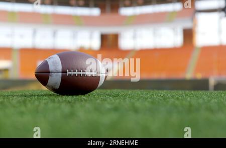 american football in football field, 3d illustration rendering Stock Photo