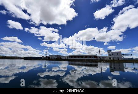 Qinghai-Tibet-Eisenbahn in China (160630) -- LHASA, June 30, 2016 -- File photo taken on June 27, 2013 shows a glass greenhouse on the Nagqu station of the Qinghai-Tibet railway, southwest China s Tibet Autonomous Region. The Qinghai-Tibet Railway turns 10 on July 1, 2016. The 1,956-kilometer-long railway, which began service in July 2006, is the world s highest and longest plateau railroad and also the first railway connecting the Tibet Autonomous Region with other parts of China. Ecological protection measures taken during and after the construction of the railway have ensured it was built a Stock Photo