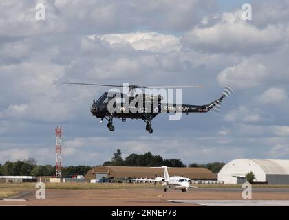Westland Wasp HAS1 helicopter operated by Navy Wings leaves the 2023 Royal International Air Tattoo Stock Photo
