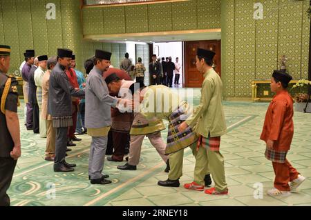 (160707) -- BANDAR SERI BEGAWAN, July 7, 2016 -- Brunei s Sultan Haji Hassanal Bolkiah (L, front) shakes hands with Bruneians during Hari Raya Aidil Fitri open house celebration at the Istana Nurul Iman palace in Bandar Seri Begawan, Brunei, July 7, 2016. The Istana Nurul Iman palace, the residence of Brunei s Sultan Haji Hassanal Bolkiah, opens to the public from July 7 to July 9. The Sultan, along with other members of the royal family, will celebrate the annual Muslim festival of Hari Raya Aidil Fitri with Bruneians and foreigners at the palace, providing every visitor with free buffet and Stock Photo