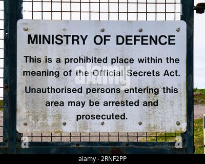 UK Official Secrets Act warning sign on the perimeter fence of a ...