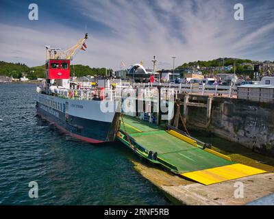 CalMac operated MV Loch Striven berthed at Oban with loading ramps deployed. This is a drive through roll on - roll off car ferry built in 1986. Pictu Stock Photo