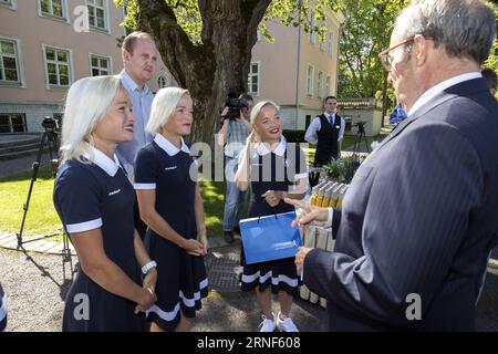 (160720) -- TALLINN, July 19, 2016 -- Estonian 30-year-old triplets marathon-runners Leila, Liina and Lily Luik attend a reception held by Estonian President Toomas Hendrik Ilves in Tallinn, Estonia, on July 19, 2016. Toomas Hendrik Ilves held a reception at the Kadriorg Palace Tuesday for the members of Estonian delegation for Rio Olympic Games before their departures to Rio de Janeiro. (Xinhua Photo/) (SP)ESTONIA-TALLINN-RIO OLYMPIC GAMES-ATHLETES-RECEPTION SergeixStepanov PUBLICATIONxNOTxINxCHN   160720 Tallinn July 19 2016 Estonian 30 Year Old Triplets Marathon RUNNERS Leila  and Lily Luik Stock Photo