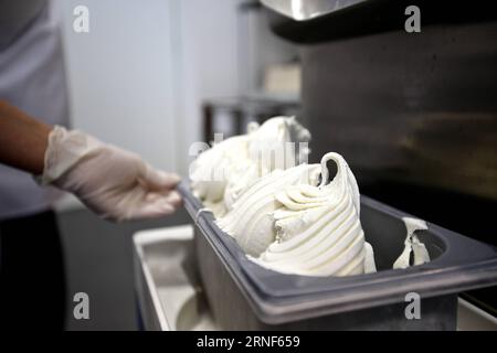 Carpigiani Speiseeis Universität in Bologna (160720) -- BOLOGNA, July 19, 2016 -- Photo take on July 19, 2016 shows the newly made gelato coming out of a machine in the classroom of Carpigiani Gelato University in Bologna, Italy. Carpigiani Gelato University is located in Bologna, Italy. Founded in 2003, the school organizes 400 courses in 12 locations around the world, such as Italy, China, France, USA and Brazil. ) (sxk) ITALY-BOLOGNA-CARPIGIANI GELATO UNIVERSITY-GELATO JinxYu PUBLICATIONxNOTxINxCHN   Ice cream University in Bologna 160720 Bologna July 19 2016 Photo Take ON July 19 2016 Show Stock Photo