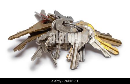 Group of Old Keys Cut Out on White. Stock Photo