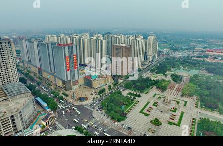 (160727) -- TANGSHAN, July 27, 2016 -- Photo taken on July 25, 2016 shows aerial view of buildings near the Earthquake Monument in downtown Tangshan, north China s Hebei Province. In the early hours of July 28, 1976, one of the deadliest earthquakes of the 20th century toppled Tangshan, killing more than 240,000 people and injuring another 160,000. The deadly earthquake leveled Tangshan in just 23 seconds, with 96 percent of the city s architecture generally destroyed. Yet Tangshan has been building a miracle on its debris ever since. By the year 2015, the per capita gross national product and Stock Photo