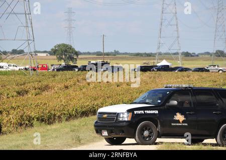Heißluftballon-Unglück in Texas (160731) -- LOCKHART, July 31, 2016 -- Local police seal off the site of a balloon crash accident near Lockhart, a city in the central part of the U.S. state of Texas, July 30, 2016. U.S. Texas Department of PUBLIC Safety has confirmed that 16 people were killed on Saturday morning after a hot air balloon caught on fire and crashed near Lockhart. The accident occurred shortly after 7:40 a.m. local time on Saturday near Lockhart, when the hot air balloon with at least 16 people on board crashed into a pasture, the Federal Aviation Administration (FAA) said in a s Stock Photo