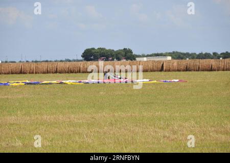 Heißluftballon-Unglück in Texas (160731) -- LOCKHART, July 31, 2016 -- Debris of the balloon is seen at the site of a balloon crash accident near Lockhart, a city in the central part of the U.S. state of Texas, July 30, 2016. U.S. Texas Department of PUBLIC Safety has confirmed that 16 people were killed on Saturday morning after a hot air balloon caught on fire and crashed near Lockhart. The accident occurred shortly after 7:40 a.m. local time on Saturday near Lockhart, when the hot air balloon with at least 16 people on board crashed into a pasture, the Federal Aviation Administration (FAA) Stock Photo