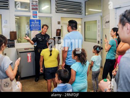 LOS ANGELES, Aug. 2,  2016 -- People take part in the 33rd National Night Out program at the Alhambra Police Department in Los Angeles, the United States, Aug. 2, 2016. The National Night Out program is held annually on the first Tuesday of August in the United States. It enables local communities to get acquainted with the Police Department and police officers. )(zcc) U.S.-LOS ANGELES- NATIONAL NIGHT OUT PROGRAM ZhangxChaoqun PUBLICATIONxNOTxINxCHN   Los Angeles Aug 2 2016 Celebrities Take Part in The 33rd National Night out Program AT The Alhambra Police Department in Los Angeles The United Stock Photo