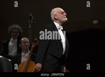 (160806) -- FRANKFURT, Aug. 6, 2016 -- Dutch conductor, organist and harpsichordist Ton Koopman takes curtain call after the performance of the Amsterdam Baroque Ensemble during Rheingau Music Festival at the Eberbach Abbey, Eltville, Germany, on Aug. 5, 2016. The 29th Rheingau Music Festival is held from June 18 to Aug. 27. ) (syq) GERMANY-ELTVILLE-MUSIC FESTIVAL-TON KOOPMAN LuoxHuanhuan PUBLICATIONxNOTxINxCHN   160806 Frankfurt Aug 6 2016 Dutch Conductor Organist and harpsichordist Sound Koopman Takes Curtain Call After The Performance of The Amsterdam Baroque Ensemble during Rheingau Music Stock Photo
