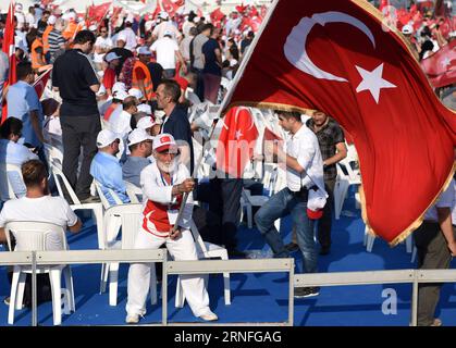 (160808) -- ISTANBUL, Aug. 8, 2016 -- A man waves Turkish national flag during a rally against the failed military coup on July 15 in Istanbul s Yenikapi square, Turkey, on Aug. 7, 2016. Weeks of rallies in protest of a foiled coup attempt in Turkey culminated on Sunday in a massive gathering here never seen in the country s modern history that called for one heart, one nation. )(yy) TURKEY-ISTANBUL-RALLY HexCanling PUBLICATIONxNOTxINxCHN   160808 Istanbul Aug 8 2016 a Man Waves Turkish National Flag during a Rally against The Failed Military Coup ON July 15 in Istanbul S Yenikapi Square Turke Stock Photo