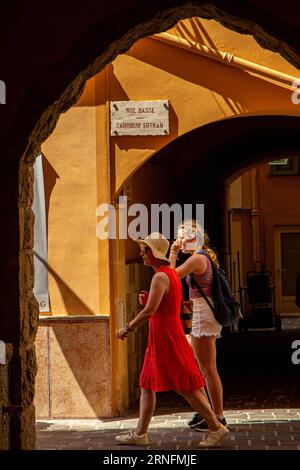 The alley ways and beautiful colourful houses of Monaco old town Stock Photo