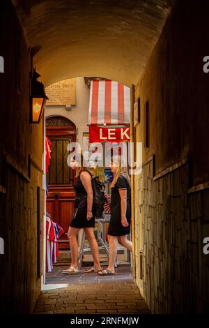 The alley ways and beautiful colourful houses of Monaco old town Stock Photo