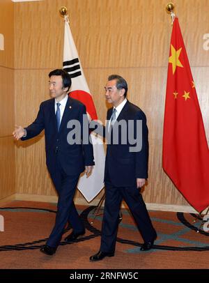 (160824) -- TOKYO, Aug. 24, 2016 -- Chinese Foreign Minister Wang Yi (R) meets with his South Korean counterpart Yun Byung-se in Tokyo, Japan, Aug. 24, 2016. )(yk) JAPAN-TOKYO-CHINA-S.KOREA-FM-MEETING MaxPing PUBLICATIONxNOTxINxCHN   160824 Tokyo Aug 24 2016 Chinese Foreign Ministers Wang Yi r Meets With His South Korean Part Yun Byung SE in Tokyo Japan Aug 24 2016 YK Japan Tokyo China S Korea FM Meeting MaxPing PUBLICATIONxNOTxINxCHN Stock Photo