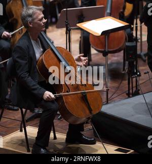 (160825) -- FRANKFURT, Aug. 25, 2016 -- German cellist Alban Gerhardt reacts during the performance in cooperation with the WDR Symphony Orchestra Cologne during Rheingau Music Festival at the Kurhaus Wiesbaden in Germany, on Aug. 25, 2016. The 29th Rheingau Music Festival is held from June 18 to Aug. 27. ) GERMAN-FRANKFURT-ALBAN GERHARDT-PERFORMANCE LuoxHuanhuan PUBLICATIONxNOTxINxCHN   160825 Frankfurt Aug 25 2016 German Cellist Alban Gerhardt reacts during The Performance in Cooperation With The WDR Symphony Orchestra Cologne during Rheingau Music Festival AT The Kurhaus Wiesbaden in German Stock Photo