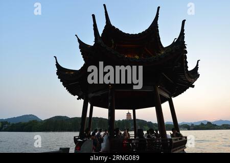 Photo taken on Aug. 29, 2016 shows the Xiying Pavillion on the West Lake in Hangzhou, capital city of east China s Zhejiang Province. West Lake, located to the west of Hangzhou where this year s G20 summit is to be held, is a renowned tourist attraction not only for its picturesque landscape but also for its association with Chinese cultures embodied with historic scholars and national heroes. ) (wx) CHINA-HANGZHOU-WEST LAKE-SCENERY (CN) YinxDongxun PUBLICATIONxNOTxINxCHN   Photo Taken ON Aug 29 2016 Shows The Xiying Pavilion ON The WEST Lake in Hangzhou Capital City of East China S Zhejiang P Stock Photo