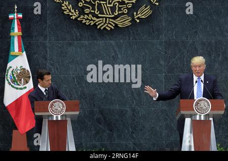 (160831) -- MEXICO CITY, Aug. 31, 2016 -- U.S. Republican presidential candidate Donald Trump (R) addresses a joint press conference with Mexican President Enrique Pena Nieto (L) after their meeting in Mexico City, capital of Mexico, on Aug. 31, 2016. Str) (fnc) (ce) MEXICO-MEXICO CITY-U.S.-TRUMP-VISIT e str PUBLICATIONxNOTxINxCHN   160831 Mexico City Aug 31 2016 U S Republican Presidential Candidate Donald Trump r addresses a Joint Press Conference With MEXICAN President Enrique Pena Nieto l After their Meeting in Mexico City Capital of Mexico ON Aug 31 2016 Str FNC CE Mexico Mexico City U S Stock Photo