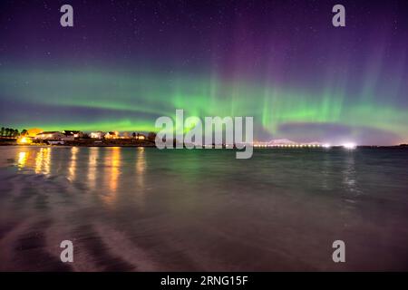 The Northern Lights over Giske island, Ålesund, Norway Stock Photo