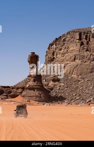 view in the Sahara desert of Tadrart rouge tassili najer in Djanet City  ,Algeria.colorful orange sand, rocky mountains Stock Photo