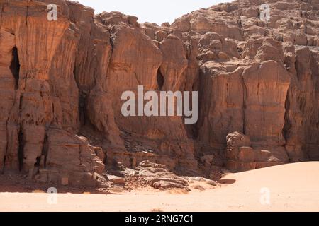 view in the Sahara desert of Tadrart rouge tassili najer in Djanet City  ,Algeria.colorful orange sand, rocky mountains Stock Photo